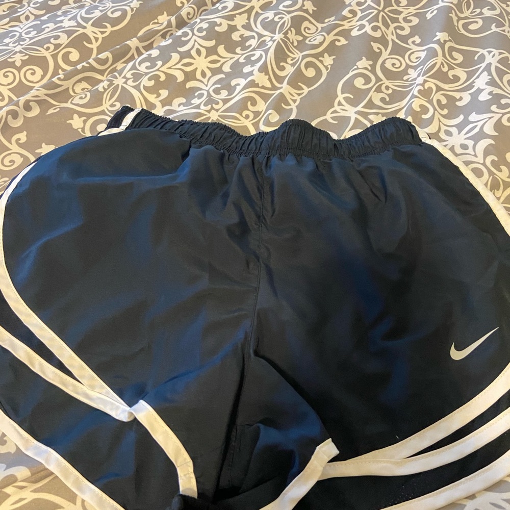 6 pack of women’s Nike running shorts